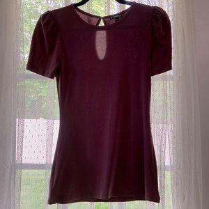 Cute top in poly/spandex.  Size XS